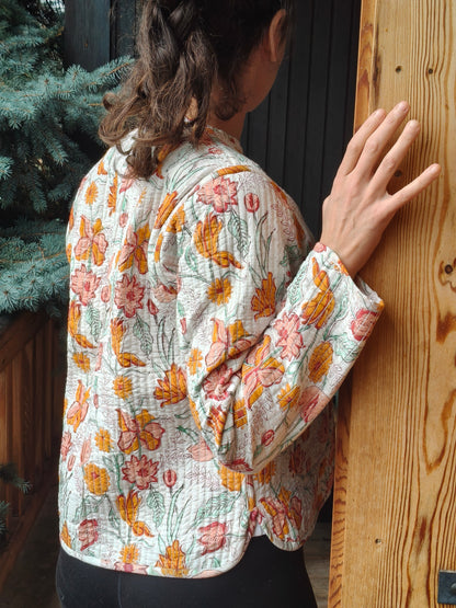 Veste à fleurs blanches en lurex