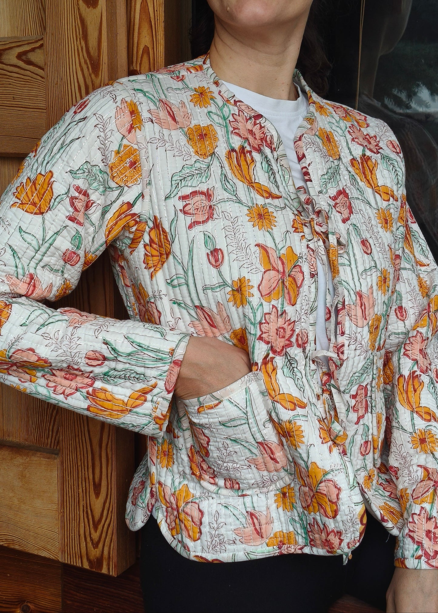 Veste à fleurs blanches en lurex