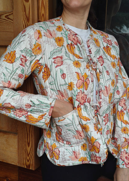 Veste à fleurs blanches en lurex