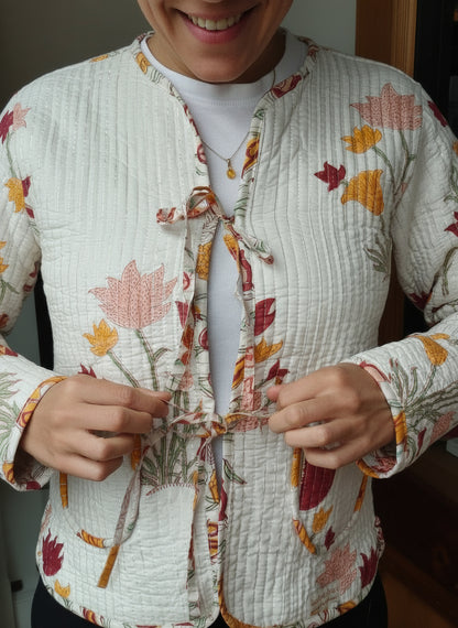 Veste à fleurs blanches en lurex